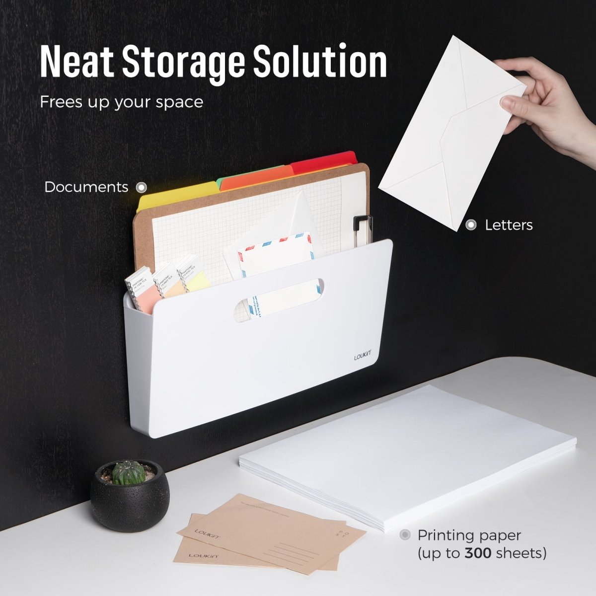 Loukin Magnetic File Holder (S1301) in white, highlighting the Neat Storage Solution feature that Frees up your space. The magnetic holder is shown attached to a vertical black surface, holding Documents and categorized folders. A hand is placing white Letters (envelopes) next to it. The foreground shows a stack of Printing paper (up to 300 sheets), demonstrating the organizer's capacity and space-saving function on a desk.