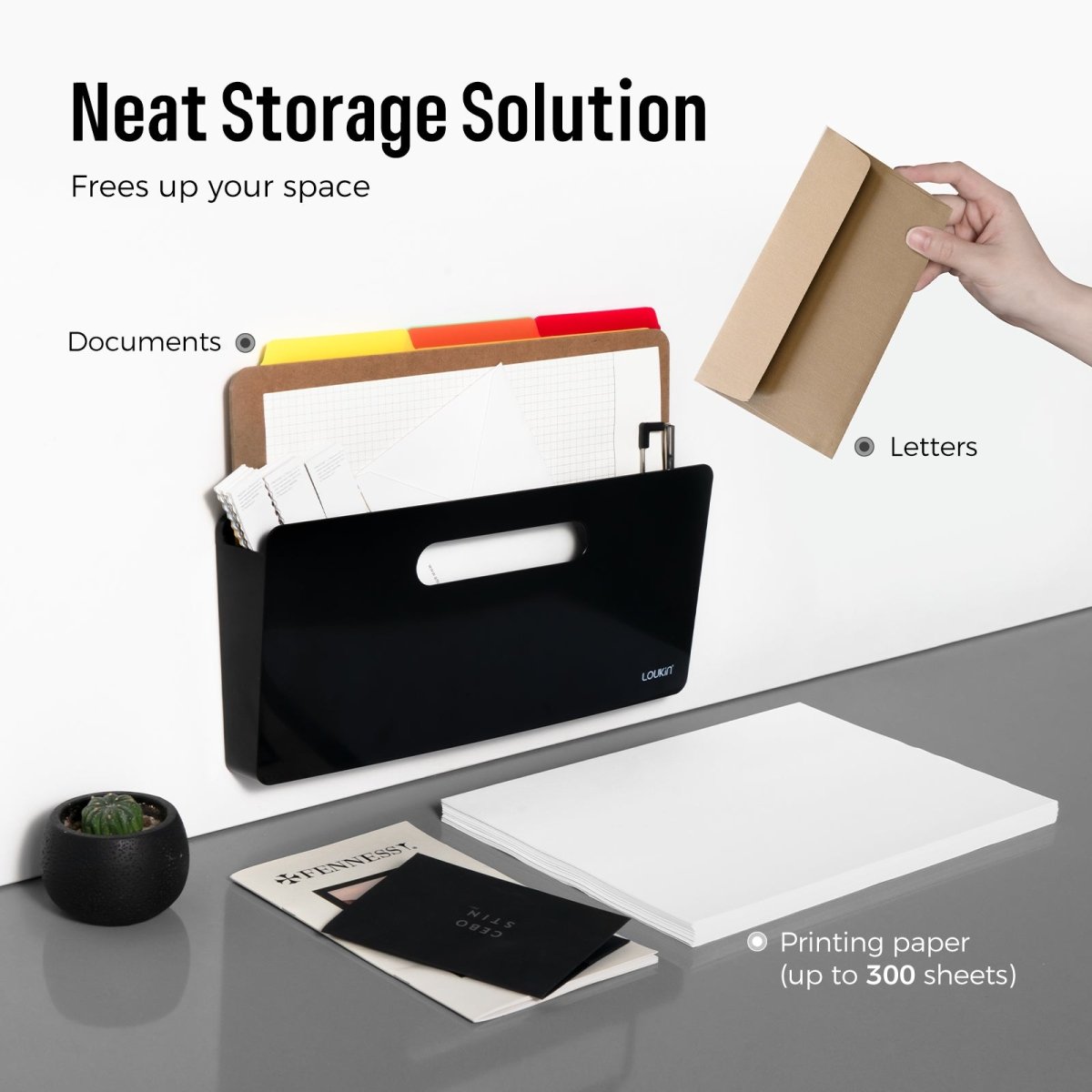 Loukin Magnetic File Holder (S1301) in black, highlighting the Neat Storage Solution feature that Frees up your space. The magnetic holder is shown attached to a vertical white surface, holding Documents and categorized folders. A hand is placing Letters (envelopes) next to it. The foreground shows a stack of Printing paper (up to 300 sheets), demonstrating the organizer's capacity and space-saving function on a desk.