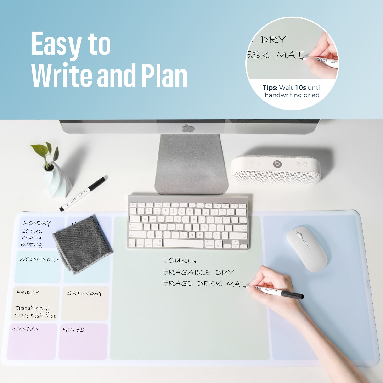 loukin W1401K EraseDeskMat marketing image highlighting the "Easy to Write and Plan" feature. The top-down view shows a hand writing on the colorful dry-erase desk mat, which is organized with sections for a weekly plan and notes beneath a computer keyboard and monitor. An inset image provides a writing tip, emphasizing the smooth writing experience.