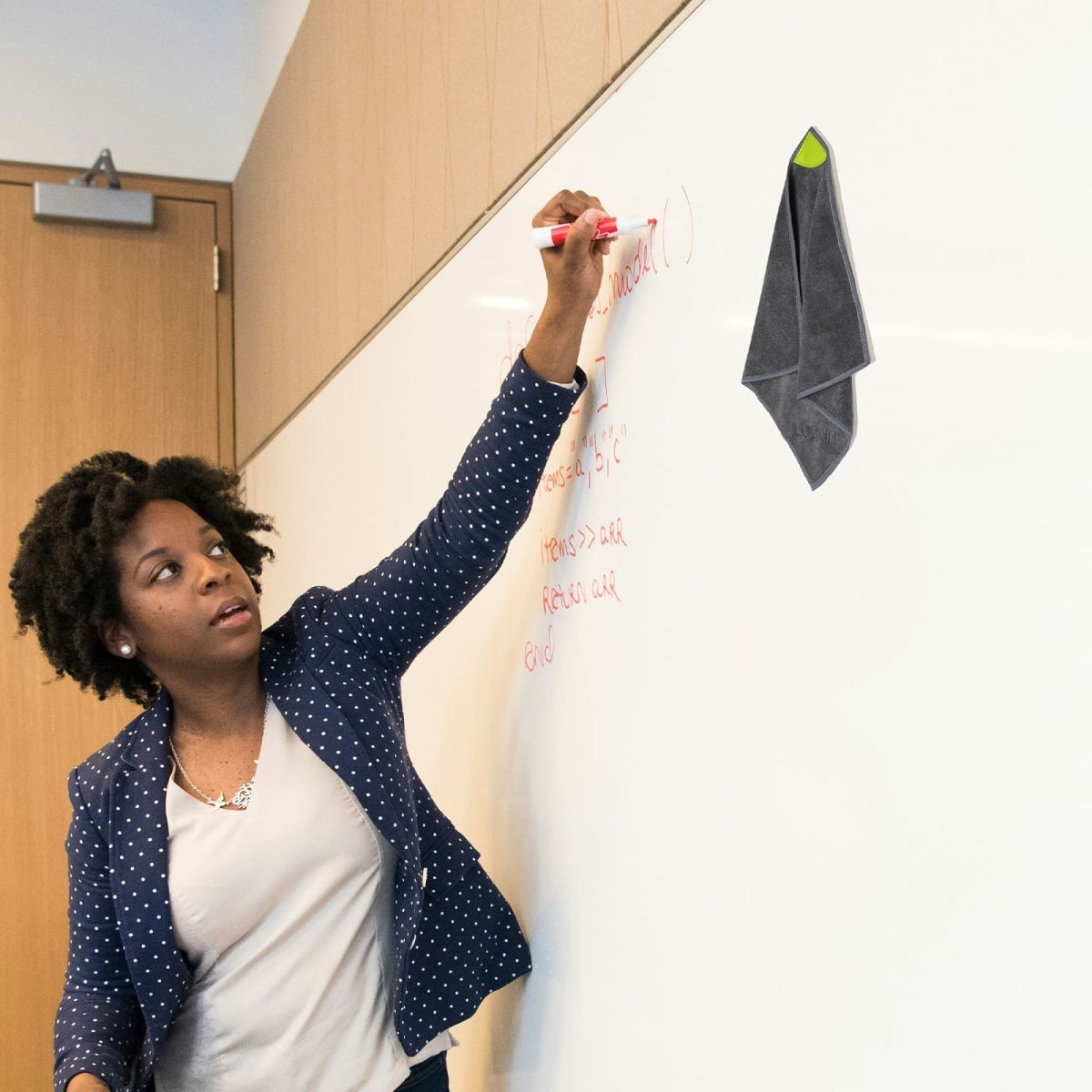 Feature image for the Loukin Magnetic Cleaning Cloth (W3306K), highlighting its "Multi-Use" functionality for both Dry Erase and Wet Erase/Cleaning. The Dry Erase panel shows the cloth cleaning a black board and wiping up spilled powder/dirt from a desk. The Wet Erase panel shows the cloth being used to wipe a drinking glass and hanging magnetically on a white refrigerator.